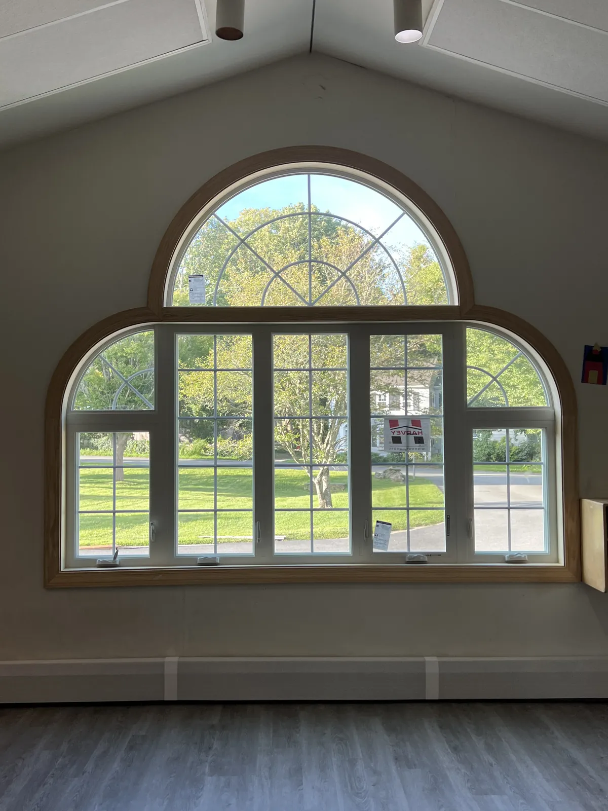 Arched palladian window installed in a vaulted room